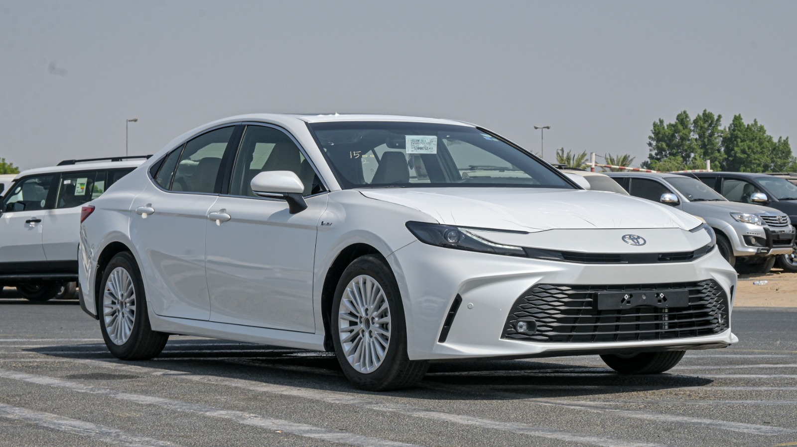 Toyota-Camry-E-Plus-2.5L-Hybrid-2025-White-Color-2.jpeg